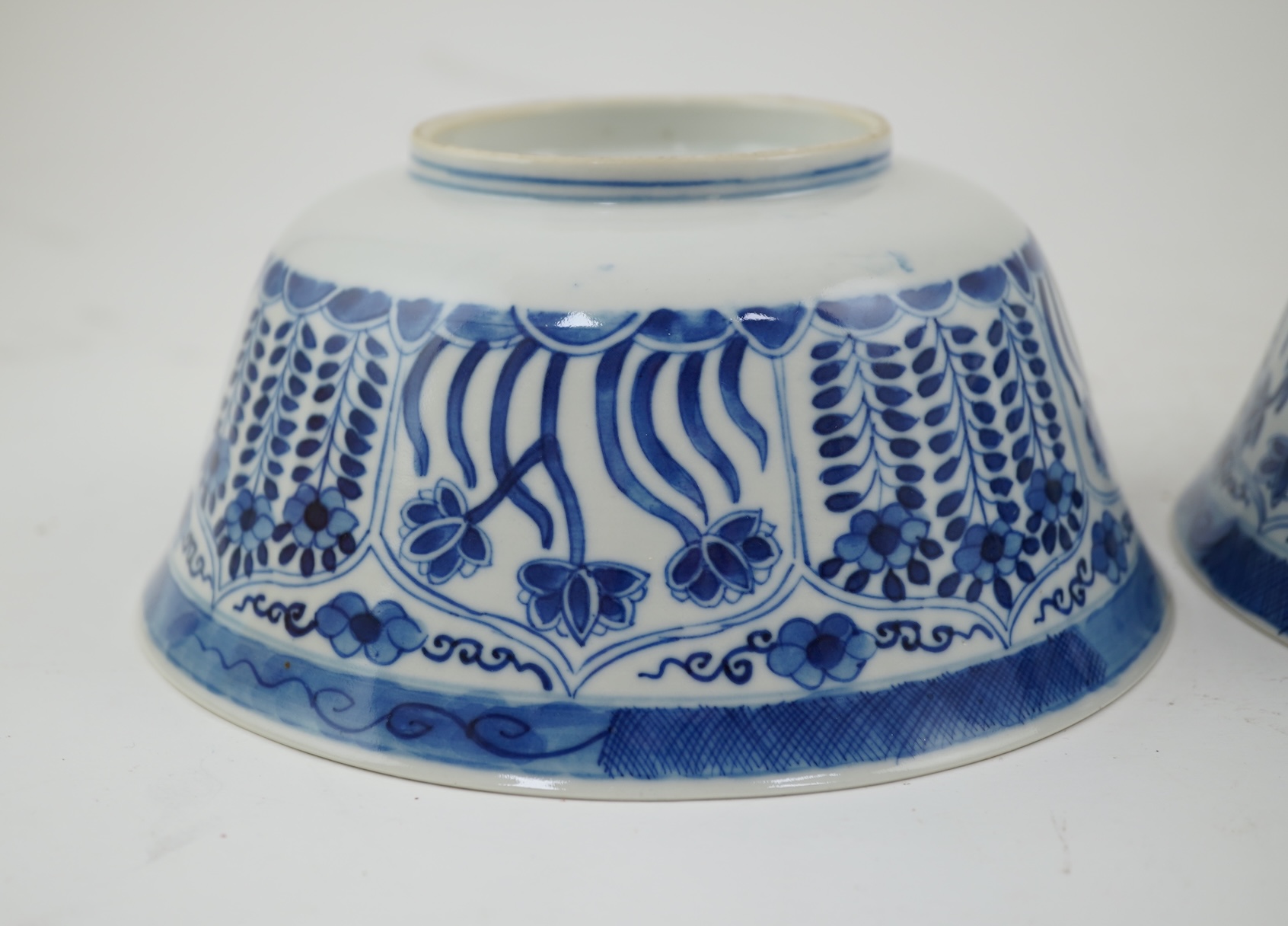 A pair of Chinese blue and white bowls, Kangxi four character mark, 19th century